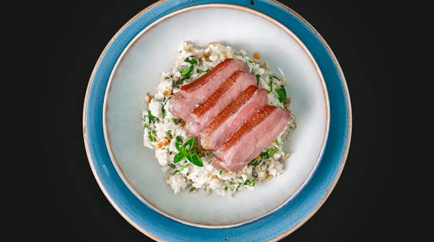 Entenbrust mit Bärlauch-Risotto und Pangrattato