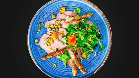 Kalbstafelspitz mit weißem Spargel in Kürbiskernpanier & Ei-Vinaigrette